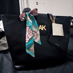 A big size design tote bag fron Ann Klein
